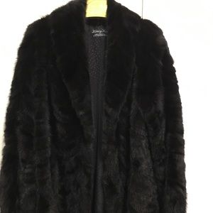 Fur coat 35 inches long. Fit woman medium, large